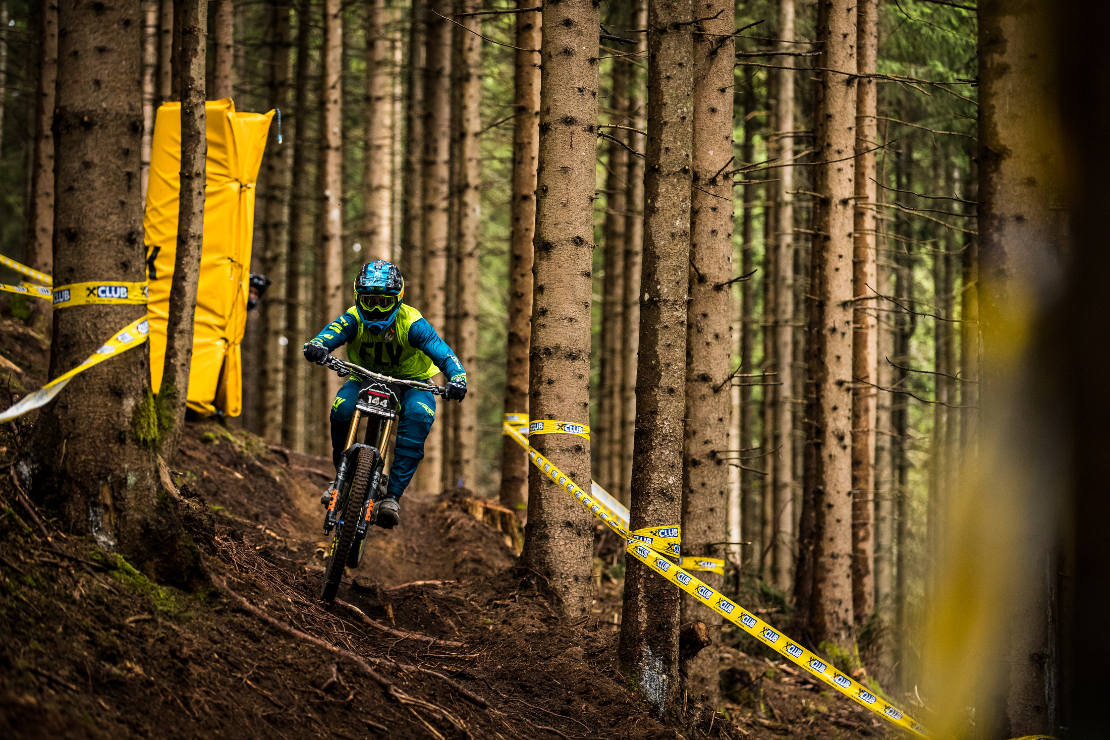 Ed Masters descends through the trees in the DH event. Crankworx Innsbruck 2019.